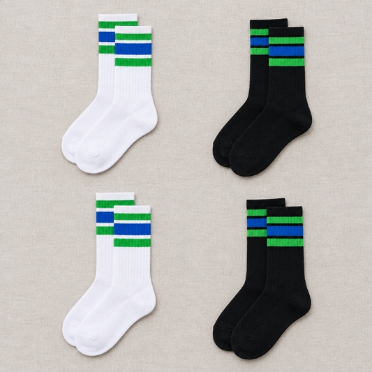 Green and blue striped socks, flat lay